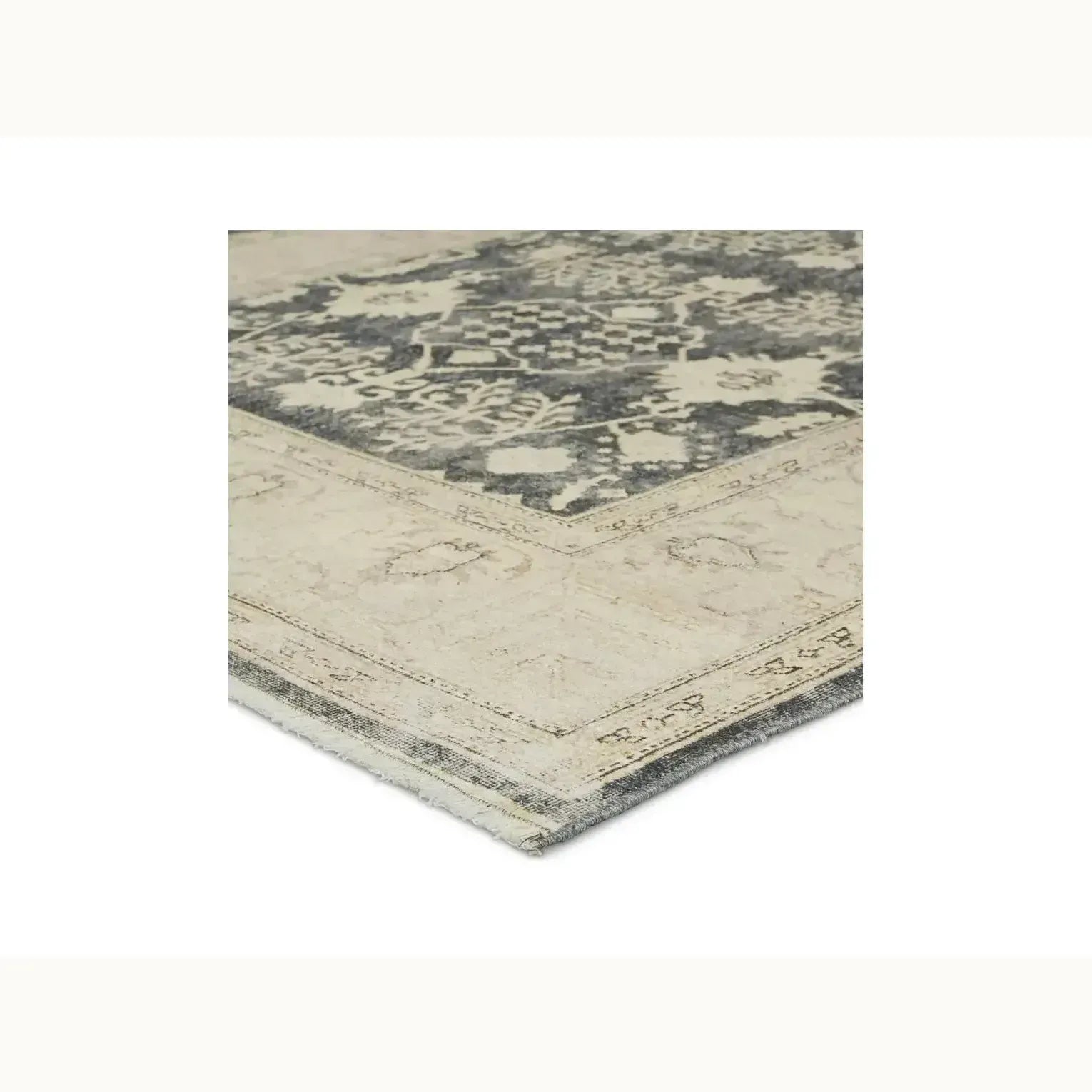 6' x 9' Beige and Grey Patterned Rug